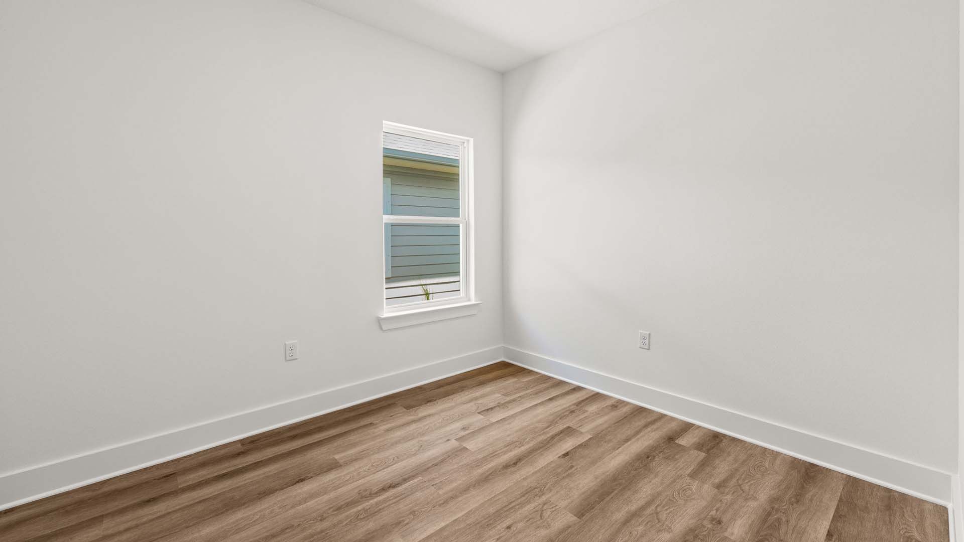 Bedroom four has EVP flooring