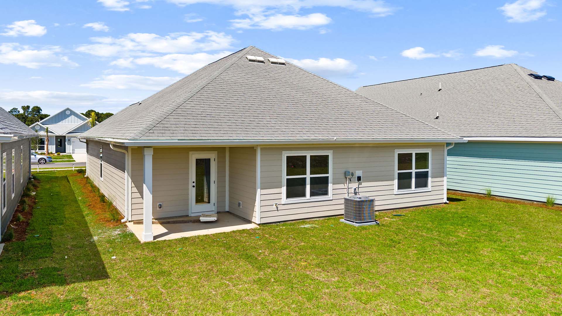 The Rhett features a covered back patio with space for seating or dining area