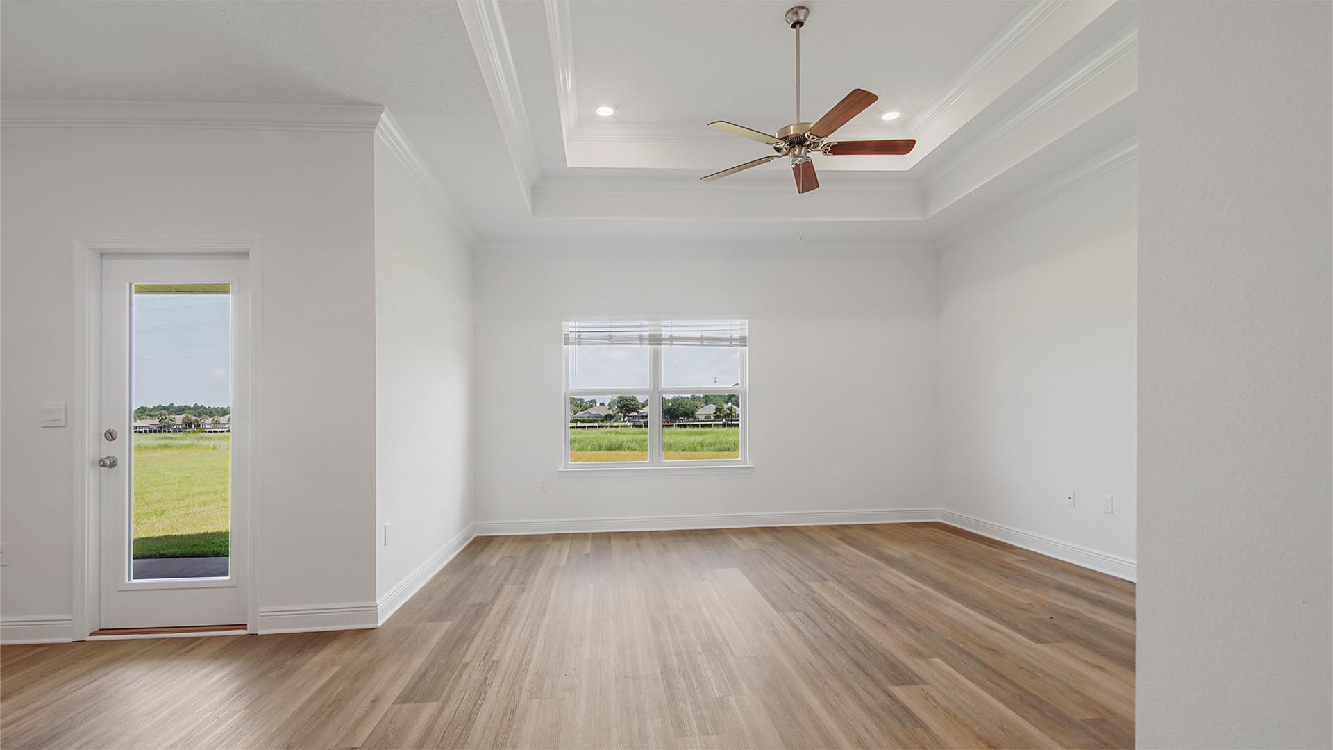 The living area is open and spacious and features EVP flooring