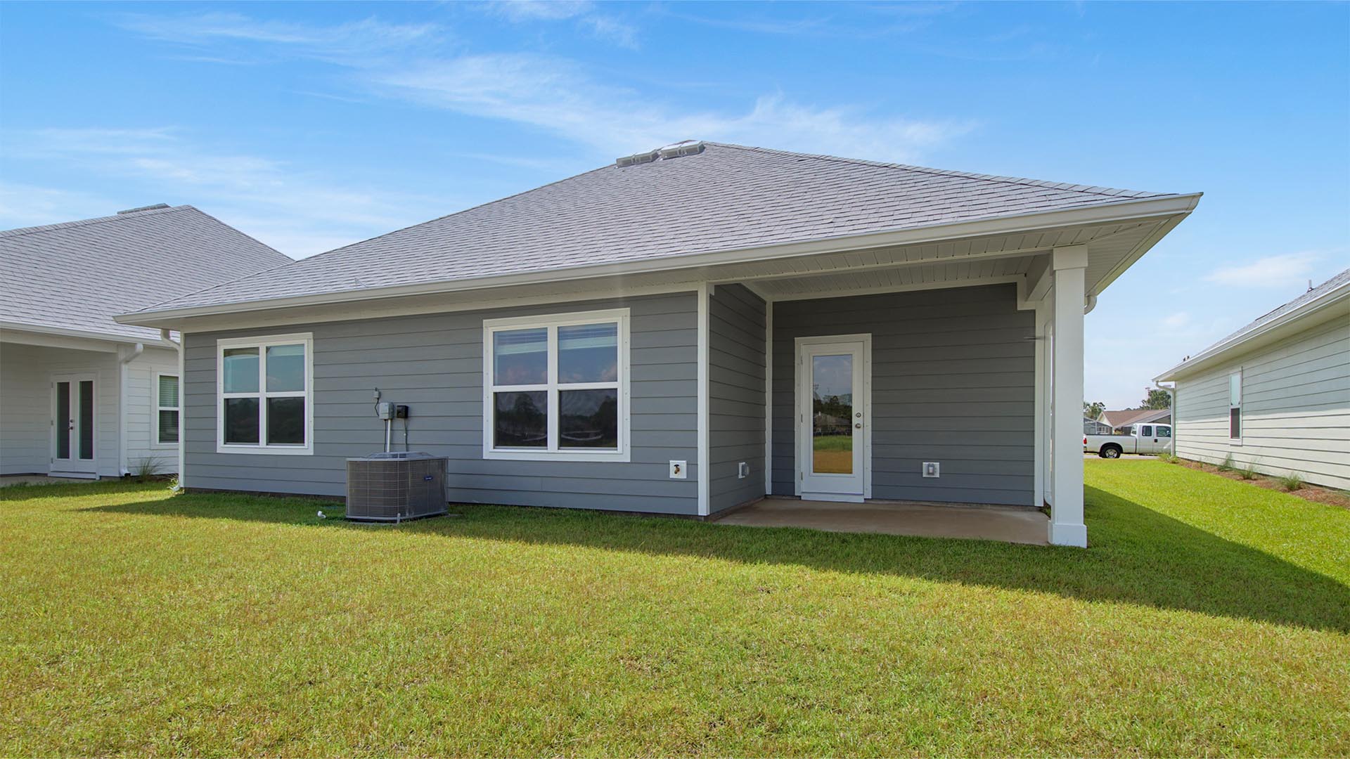 The Rhett features a covered back patio with space for seating or dining area