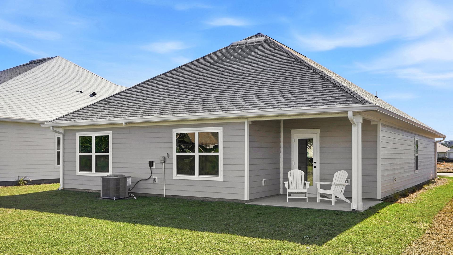 The Rhett features a covered back patio with space for seating or dining area