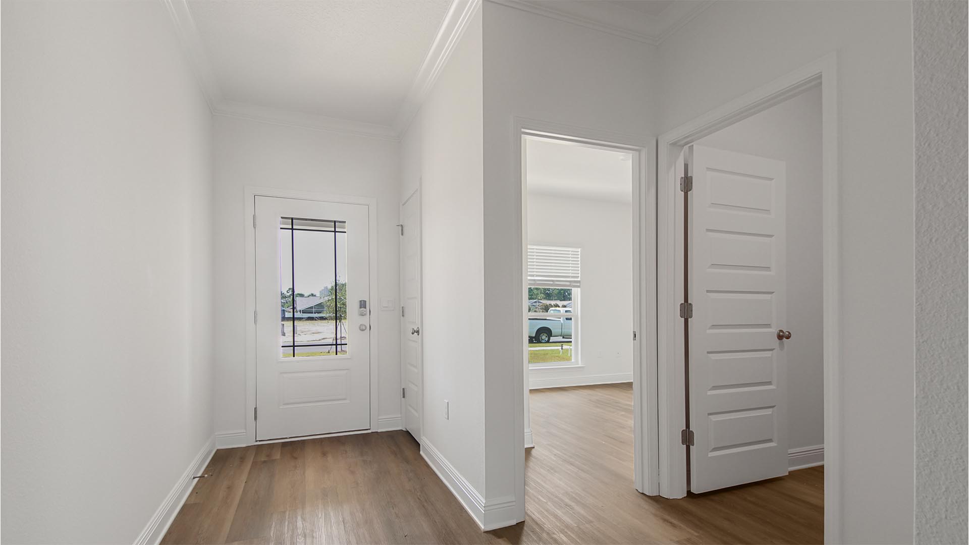 Entry hall leading to bedrooms two and three