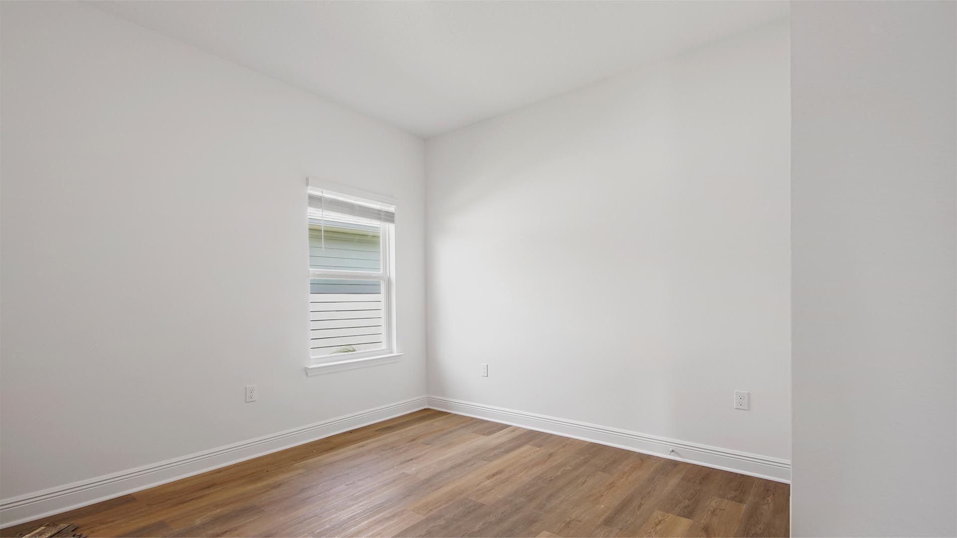 Bedroom three is spacious and has EVP flooring
