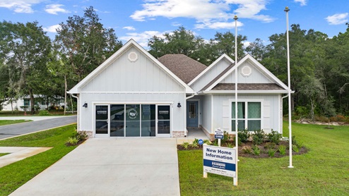 The model home and sales center is located at 15 Holley Grove Lane