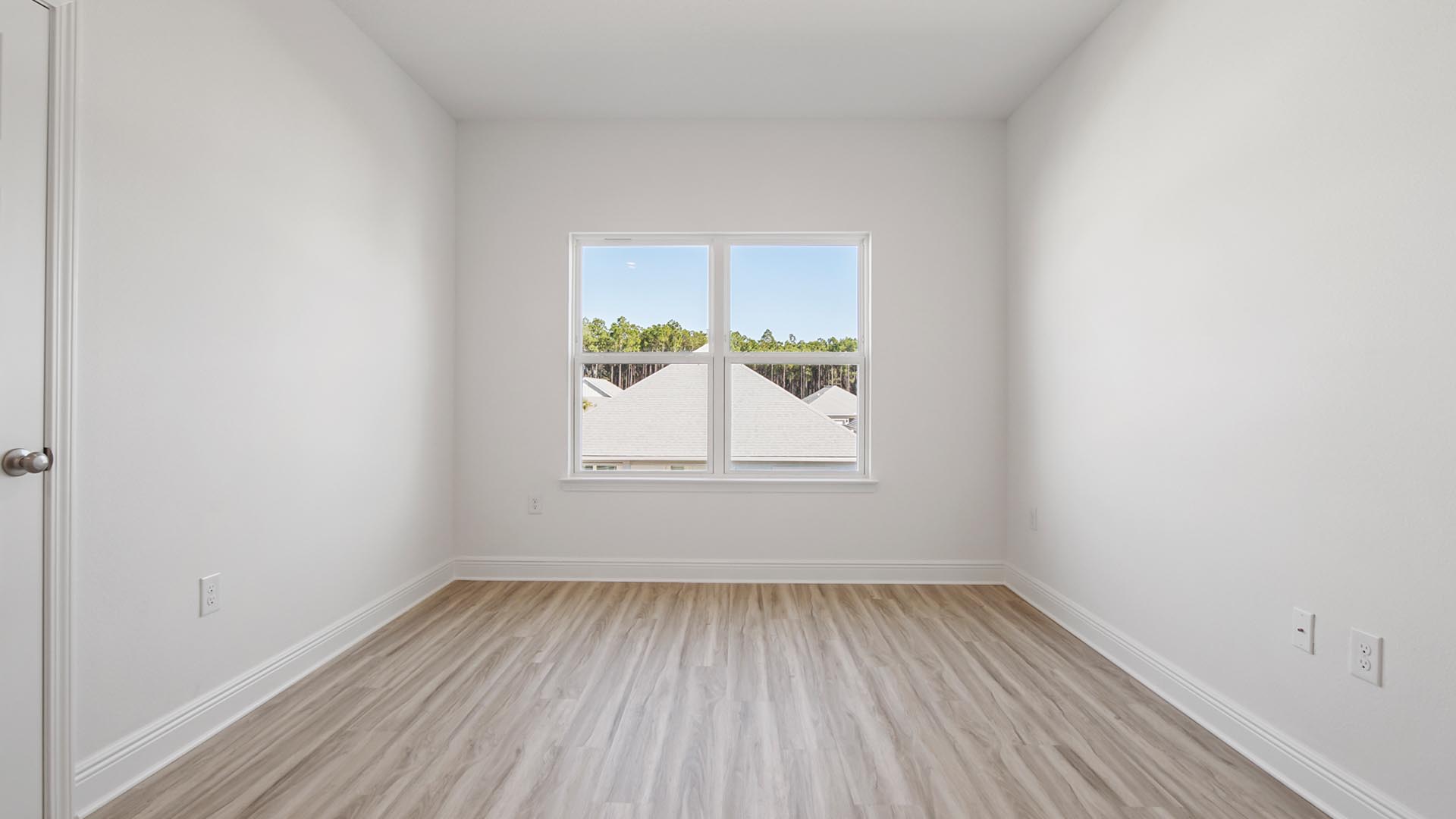 Guest bedroom five on the second level has EVP flooring