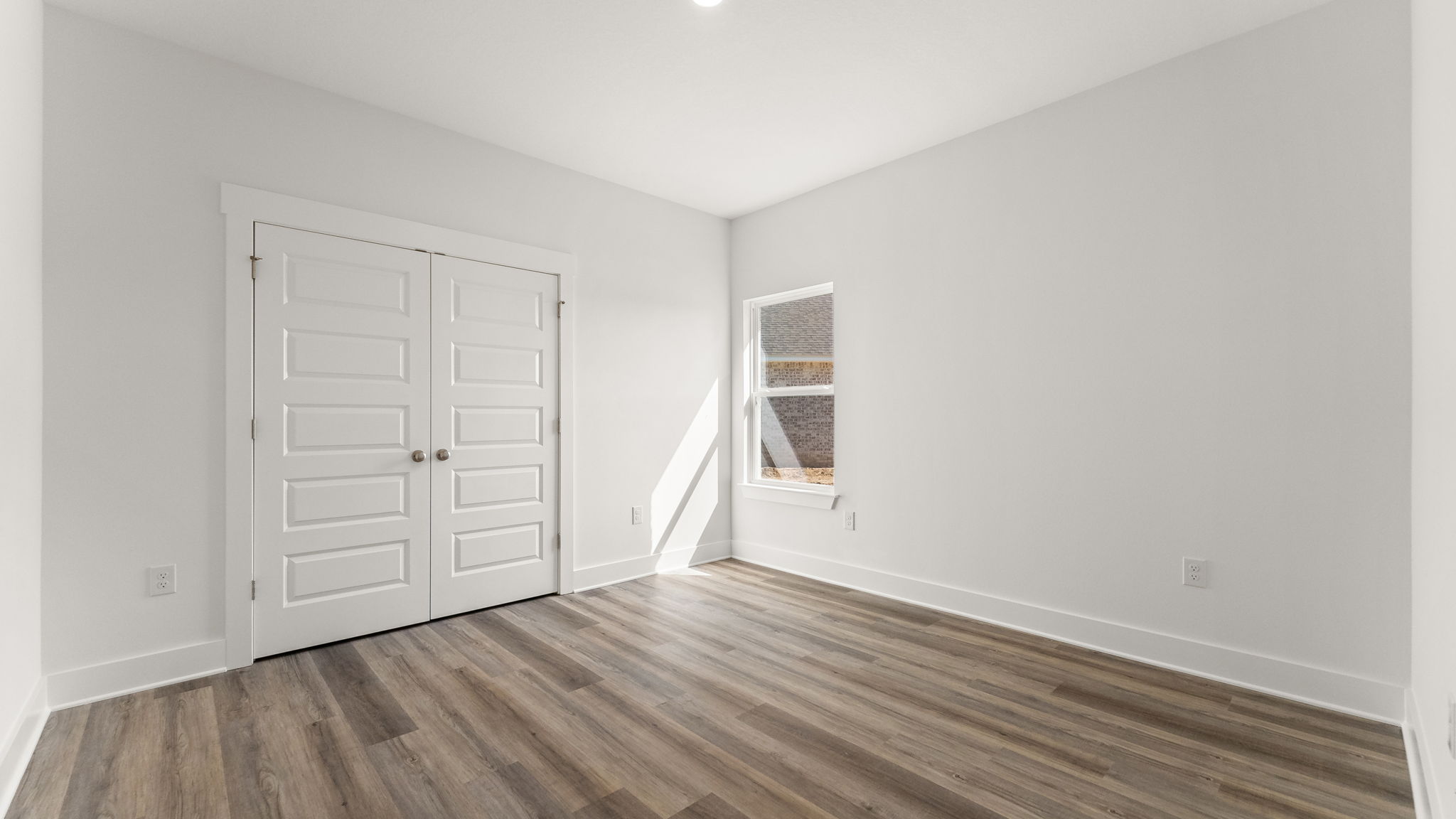 Guest bedrooms have ample closet space