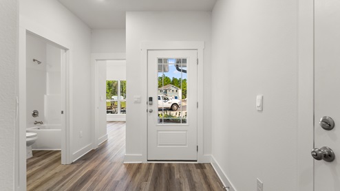 The bright entry hall in each floor plan offers a welcome home