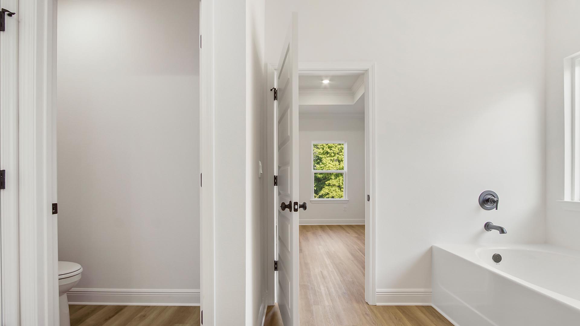 The primary bathroom has a separate water closet for privacy