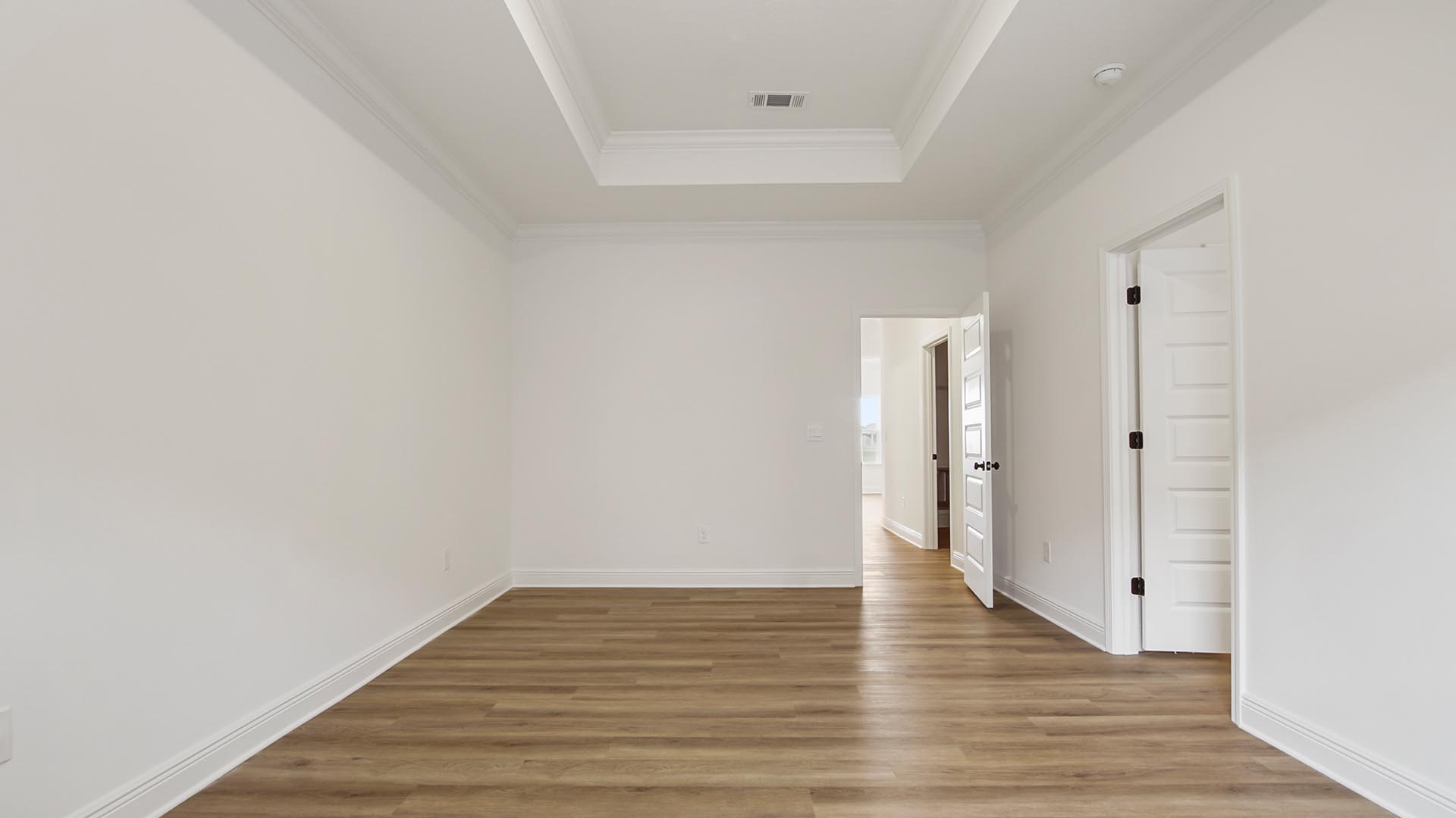 The study leads to bedroom four and has EVP flooring