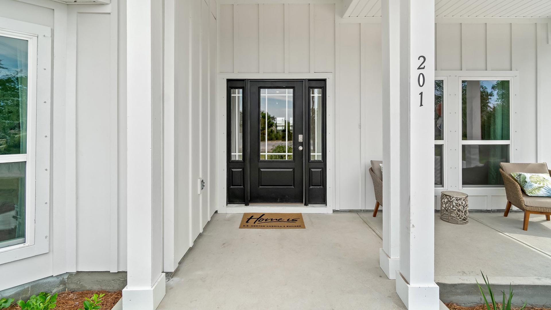 The McKenzie features a covered entry and front patio