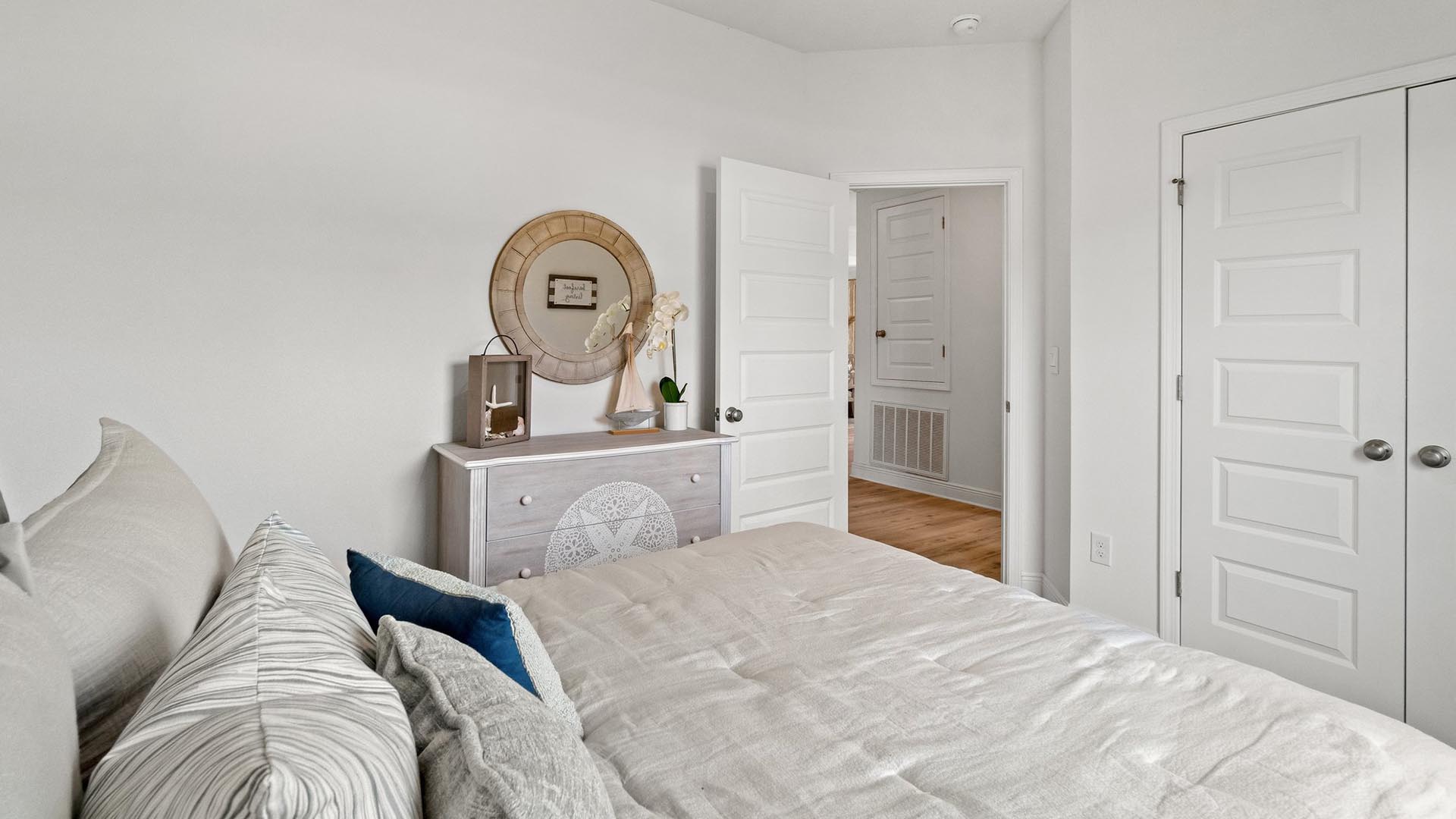 The McKenzie features two bedrooms off the living area and two along the front foyer allowing for a separate retreat