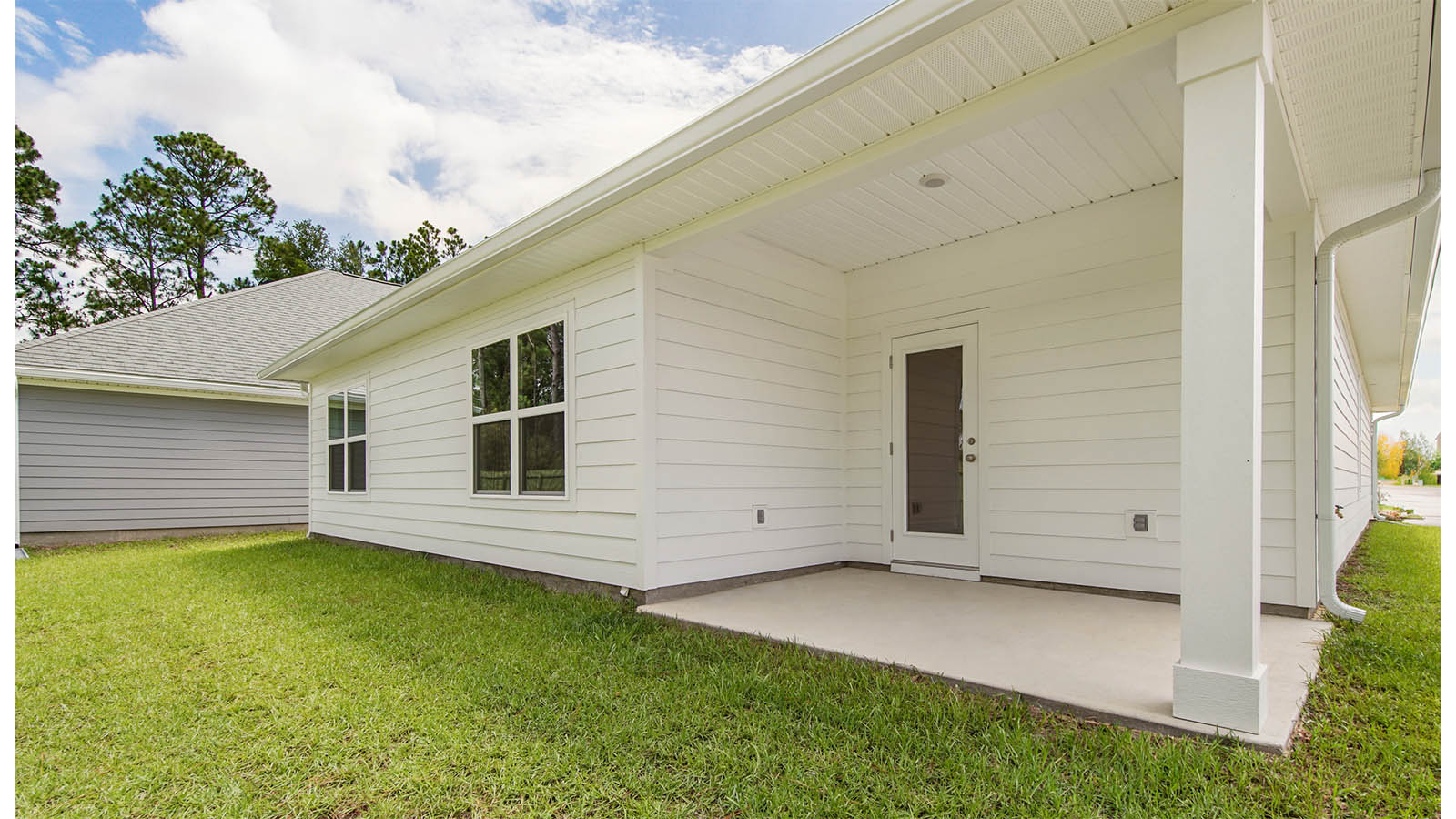 Covered patio of the Rhett floor plan has space for an outdoor dining area