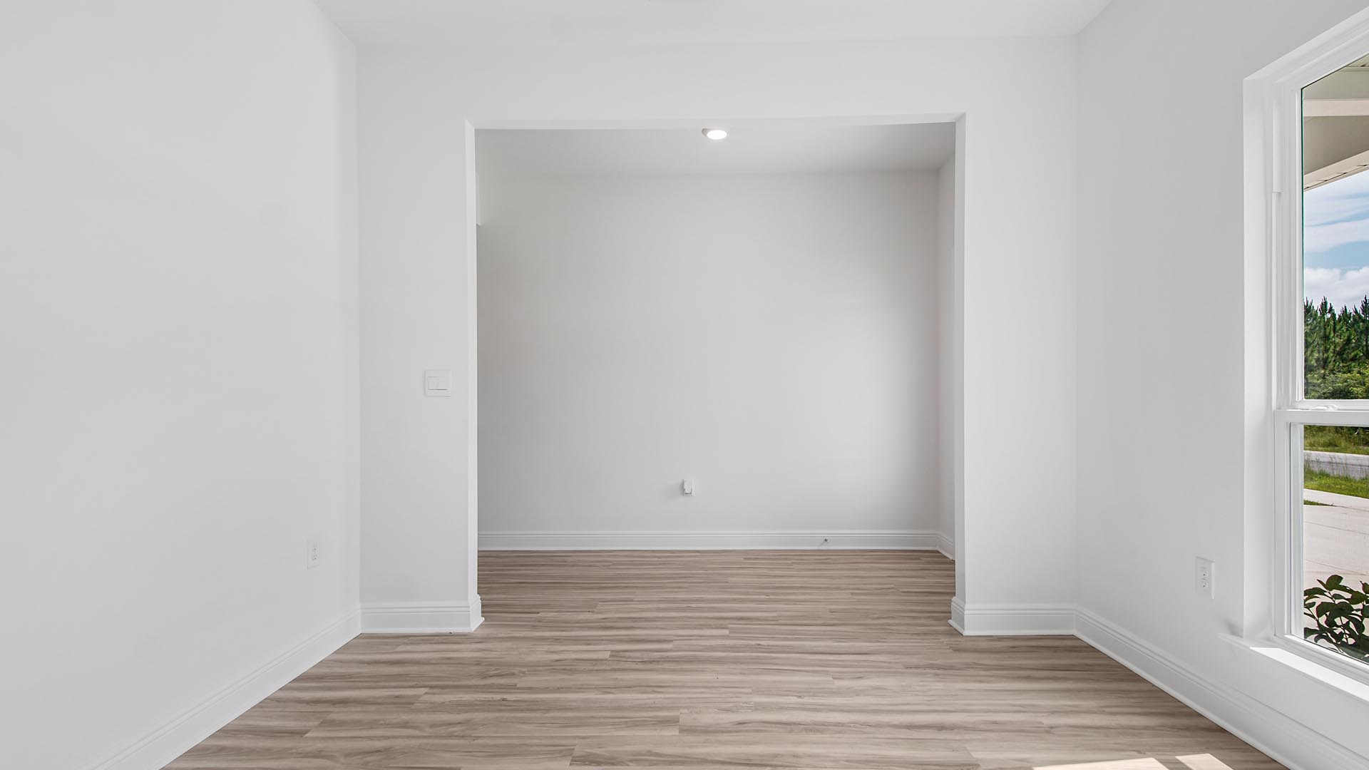 Sitting room with EVP flooring and large picture window