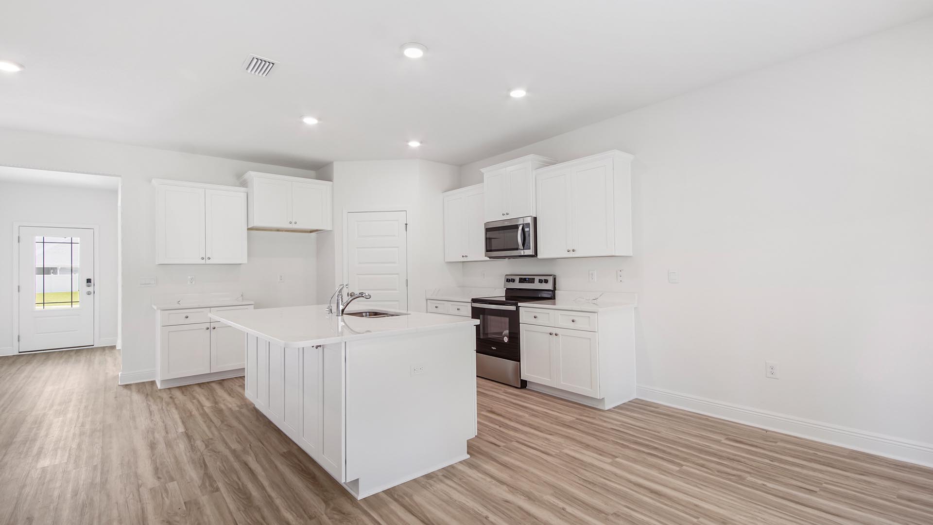 The kitchen island has space for bar seating