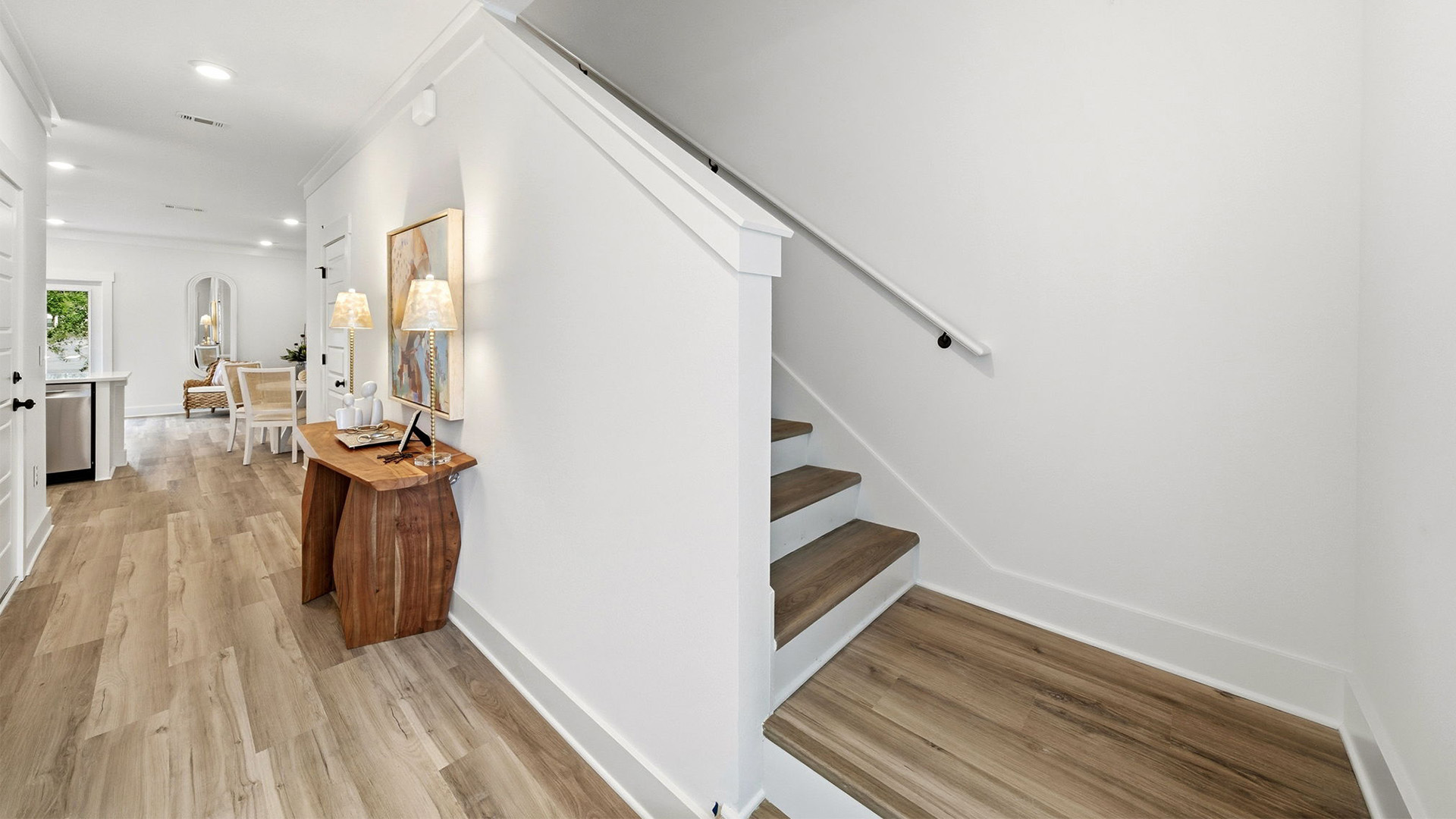 The stairs have EVP treads and the entry hall has EVP flooring