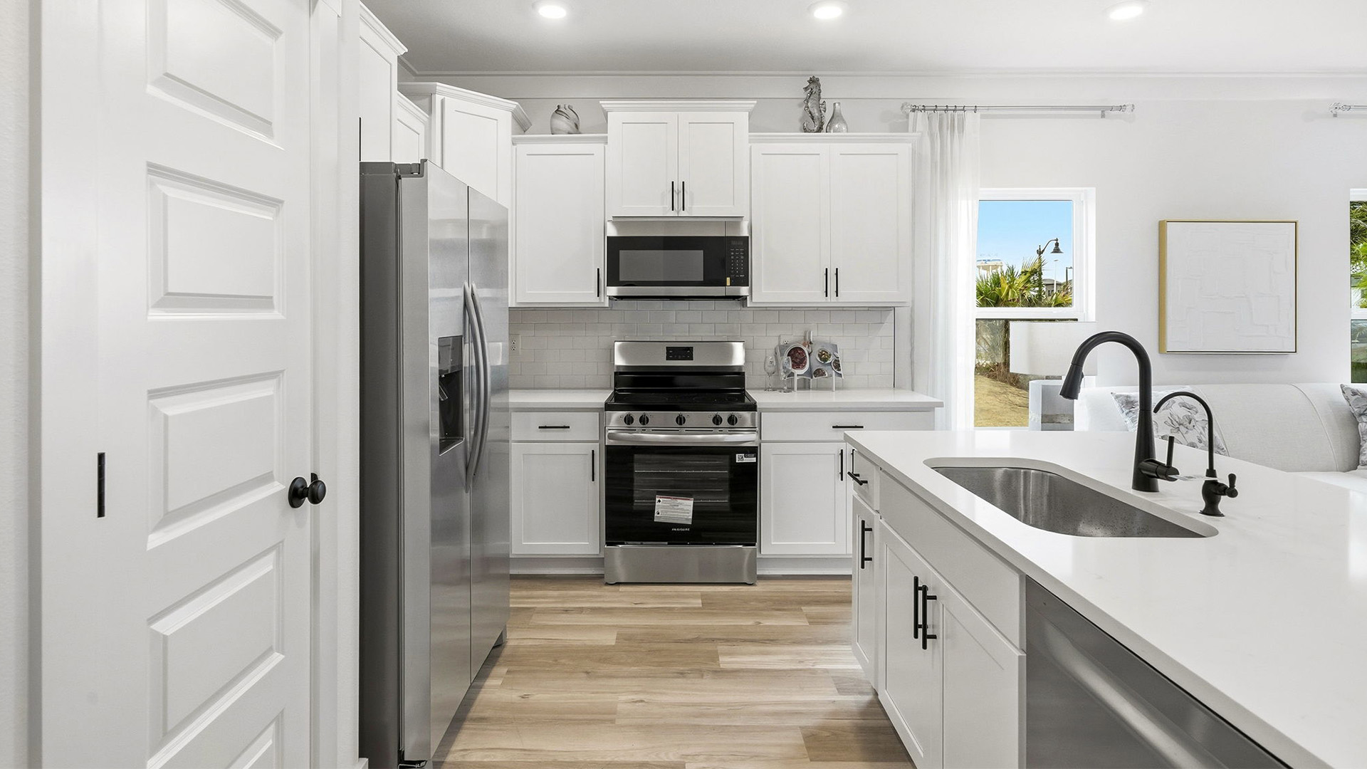 There is a center island with space for meal service and clean up