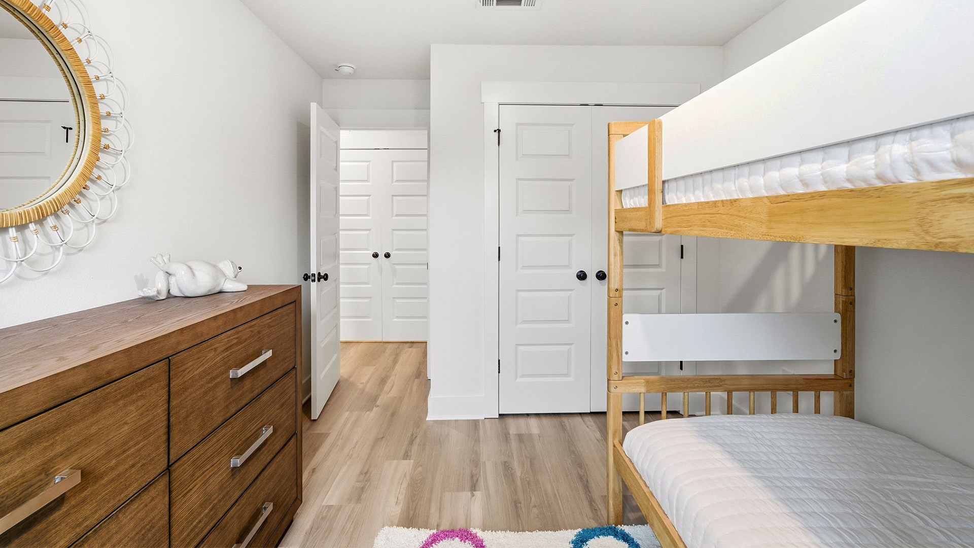 This image shows the guest bedroom with a bunk bed
