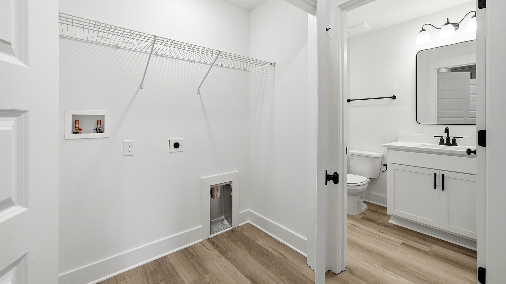 There is a laundry area just outside of the guest bedrooms