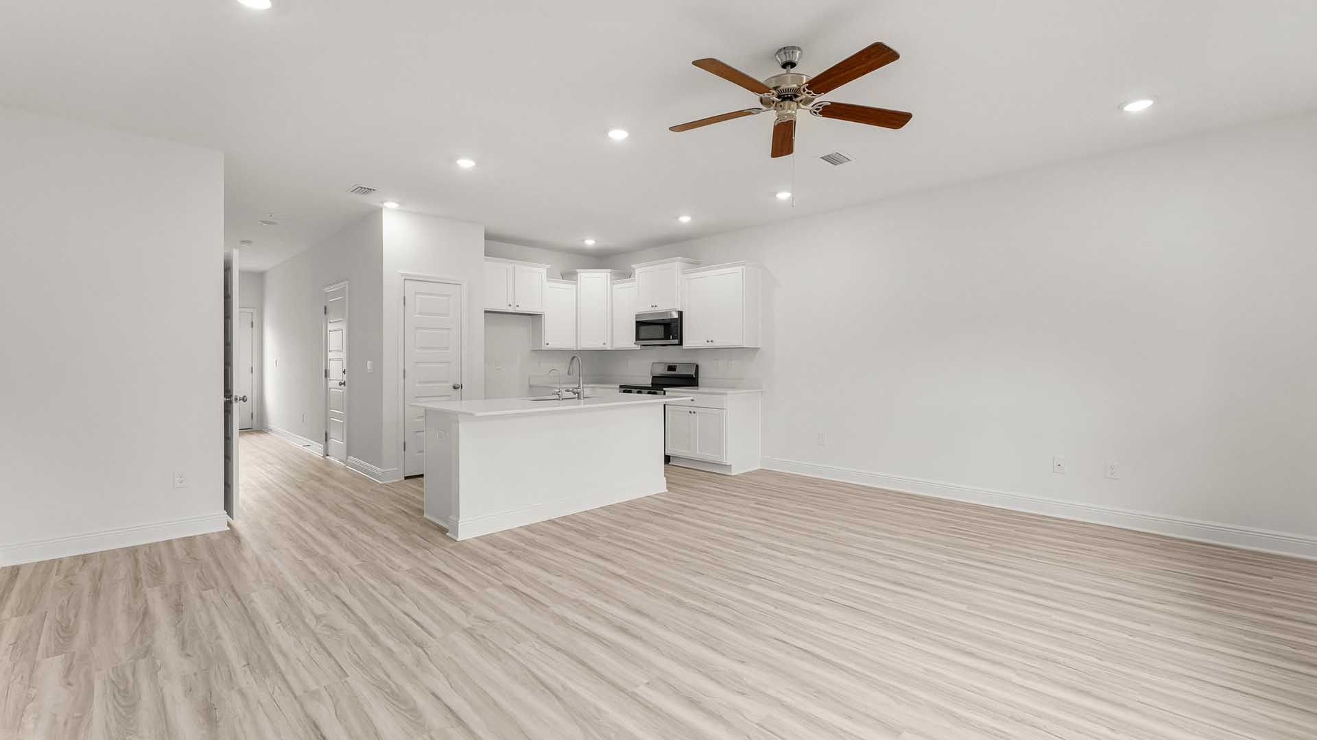 The dining area provides access to the back patio and is spacious.