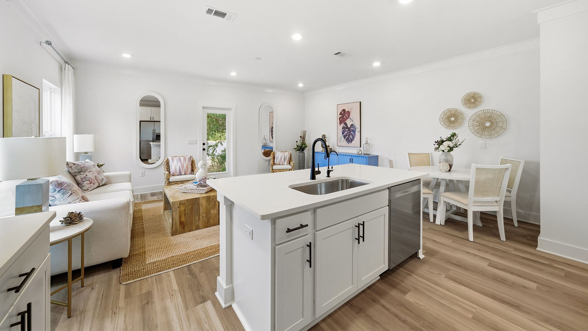 The kitchen looks over the living area