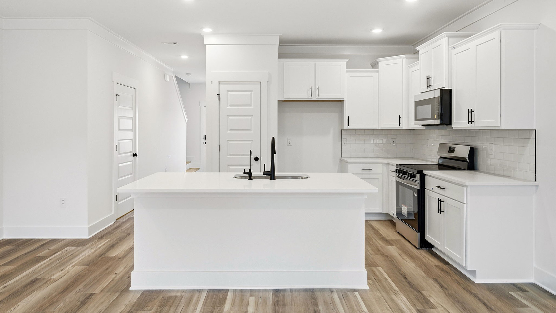 The kitchen has plenty of storage options