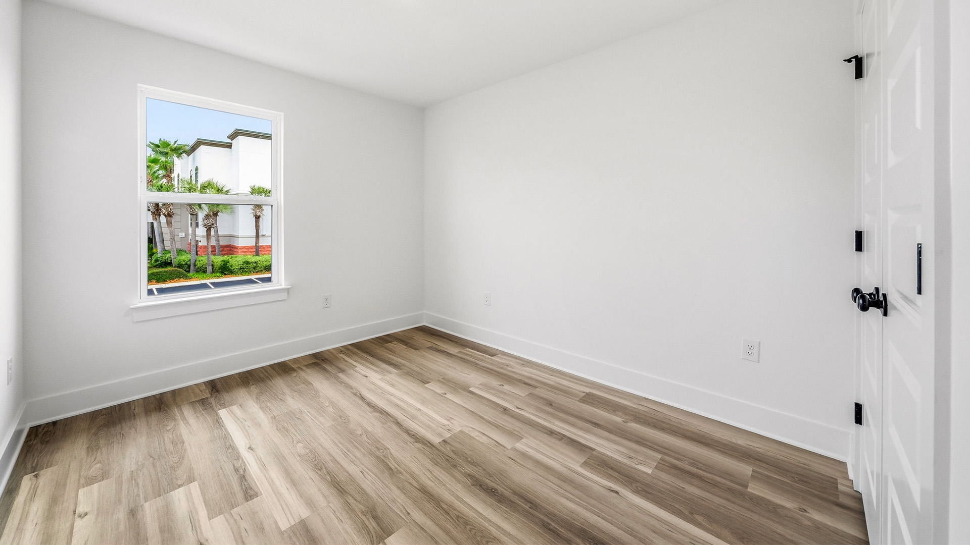 The second guest bedroom is next to the shared bathroom