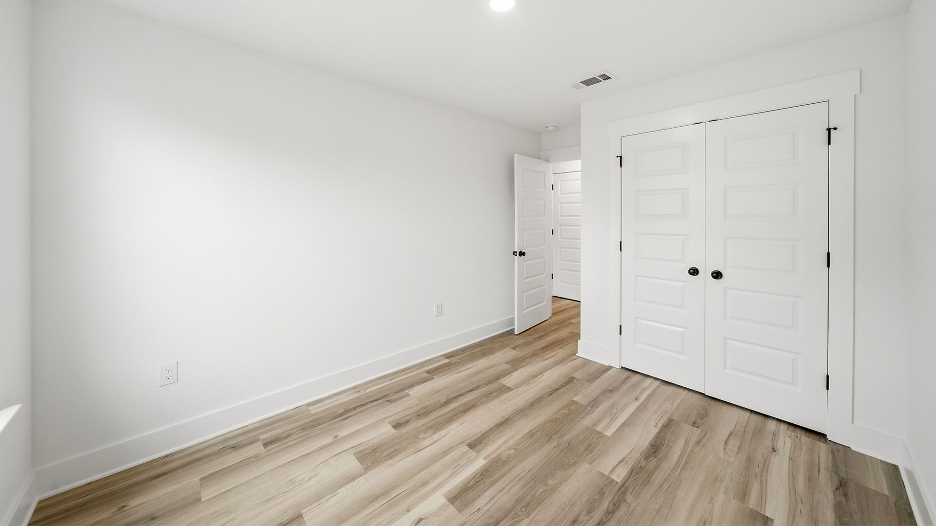 The guest second guest bedroom has ample closet space