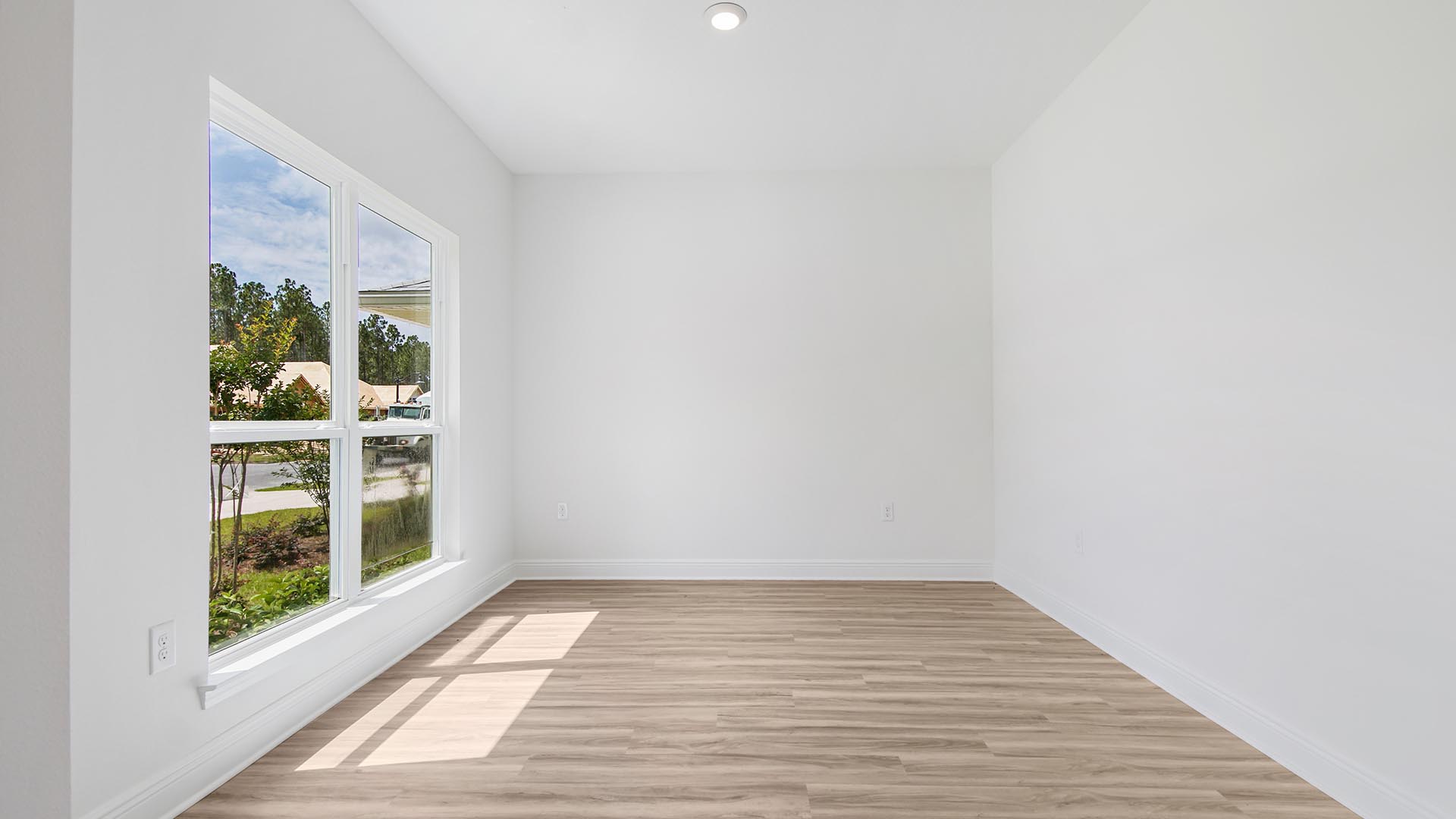 Main level has a formal sitting or dining