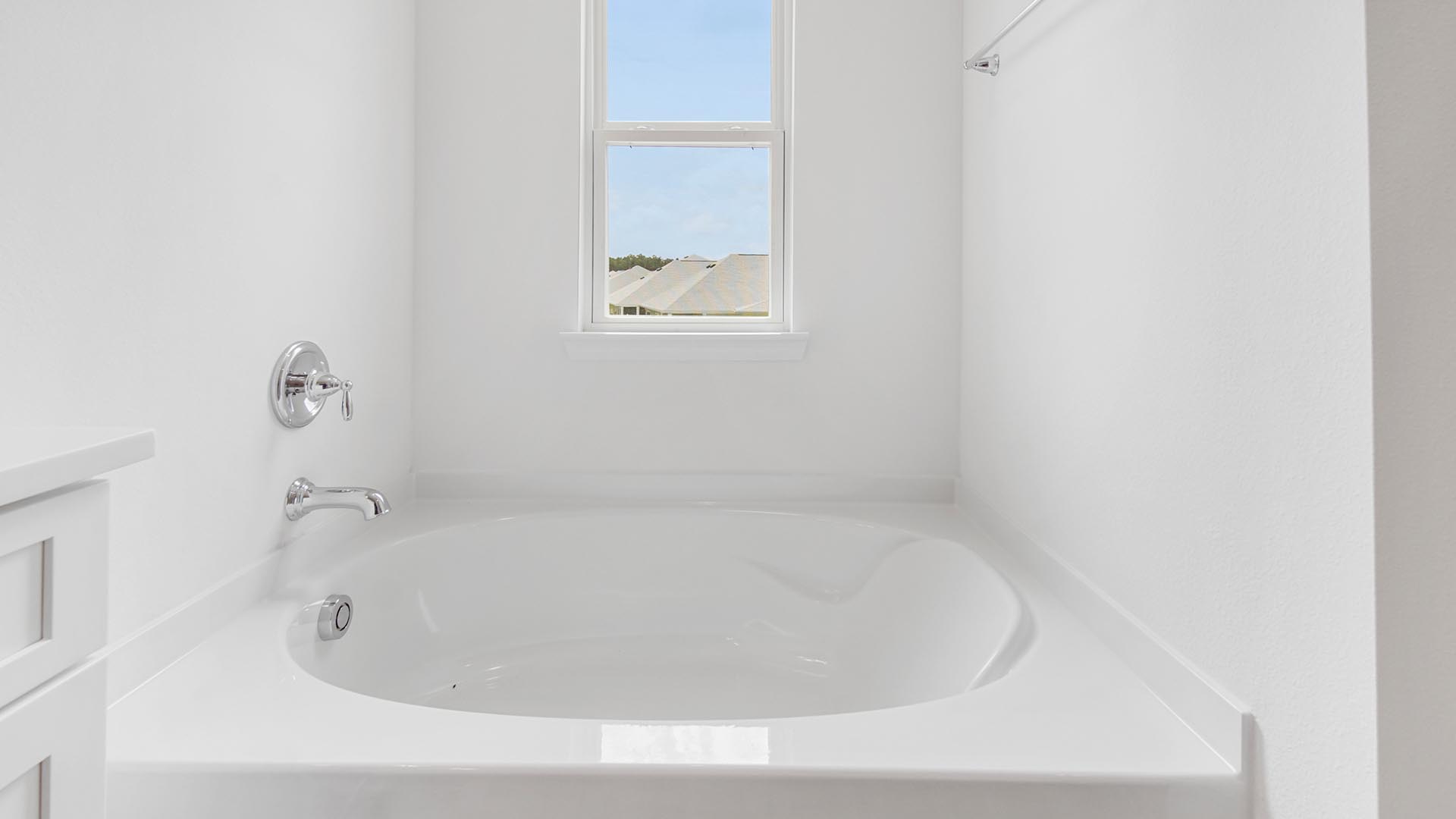 The large soak tub in the primary bathroom