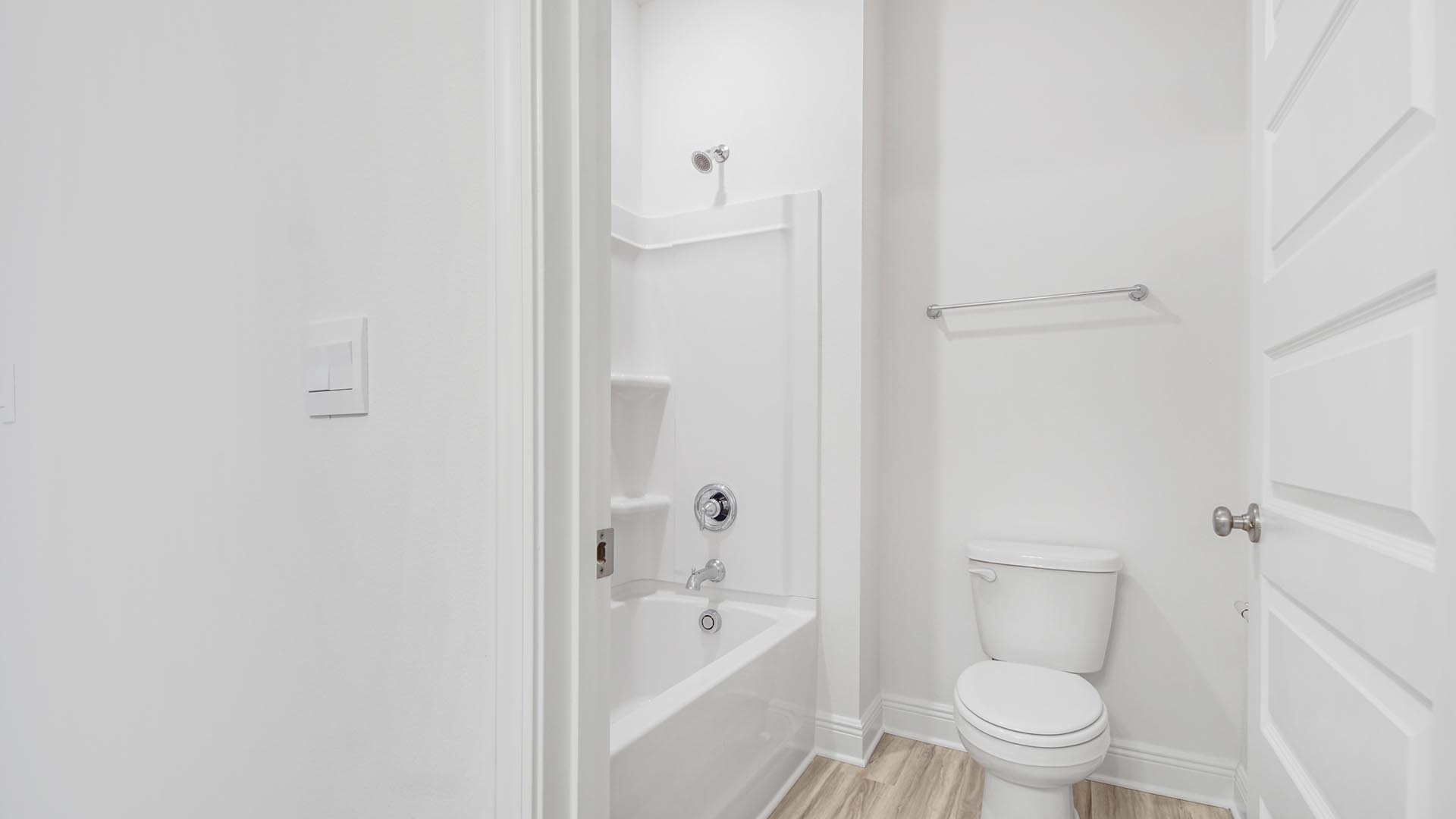 The shared bathrooms have quartz countertops