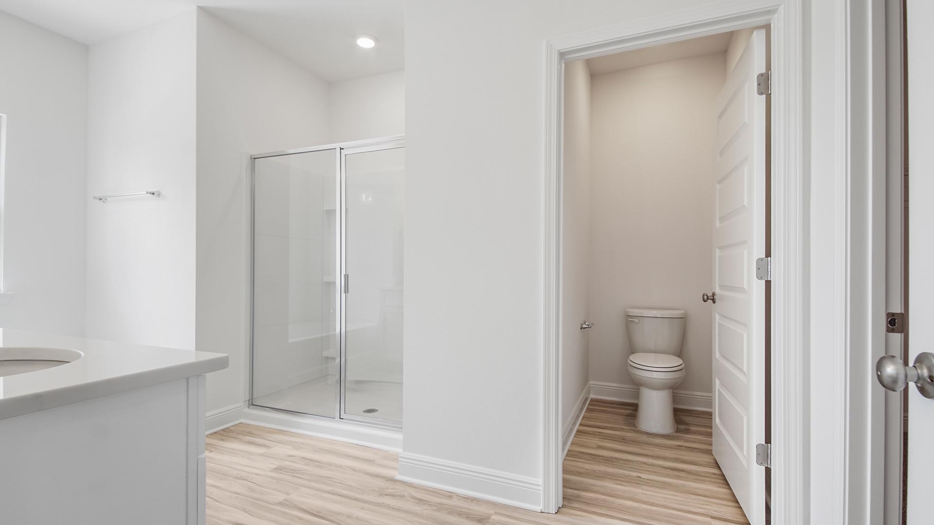 The primary bathroom has a separate water closet for privacy