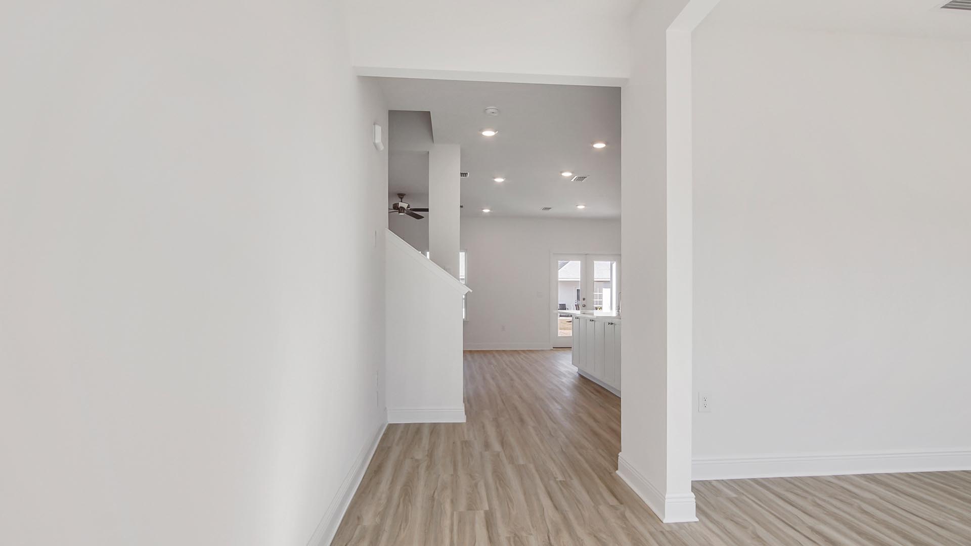 Main level has a formal sitting or dining