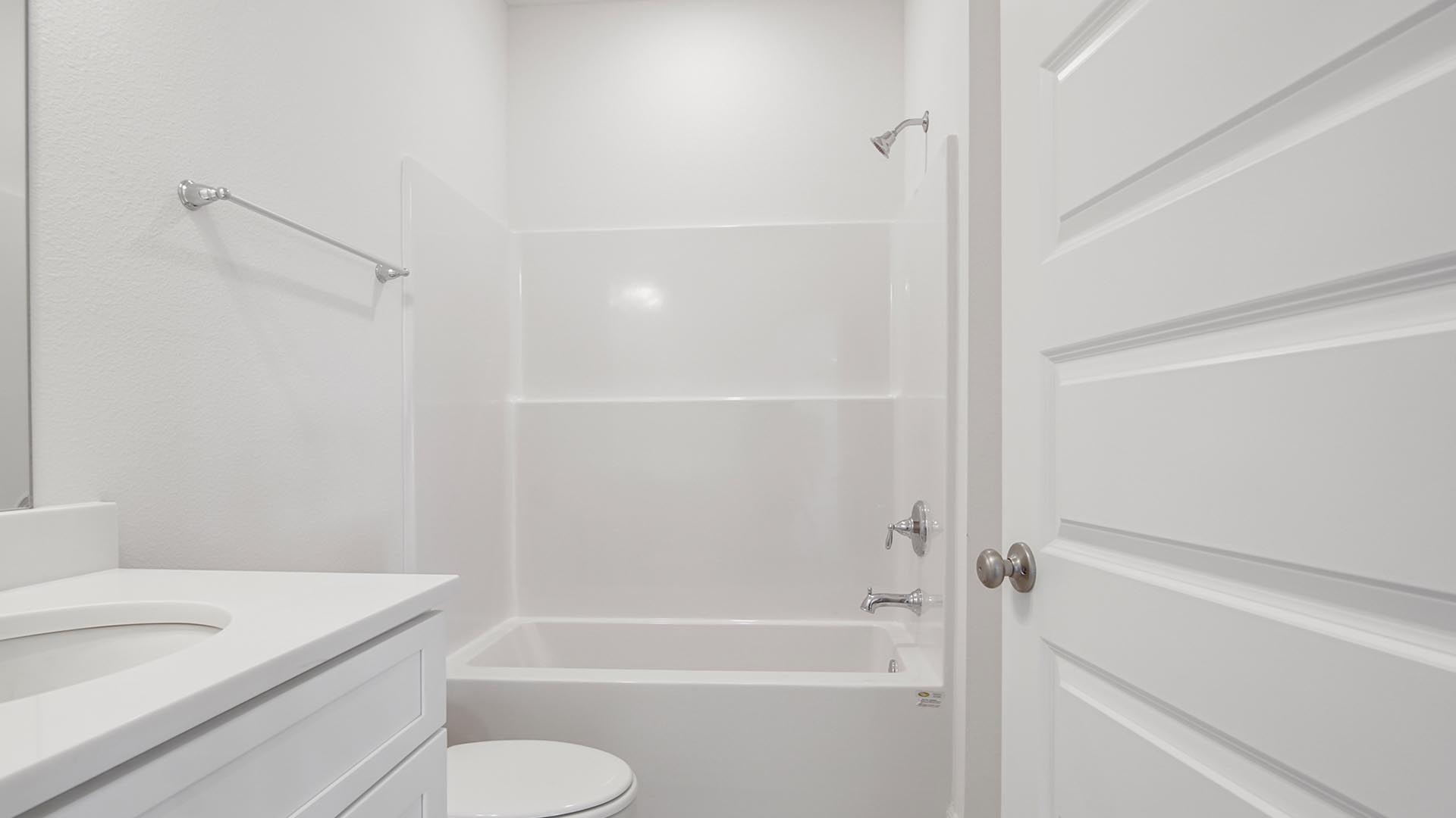 There is a full bathroom on the main level with a shower and tub combination