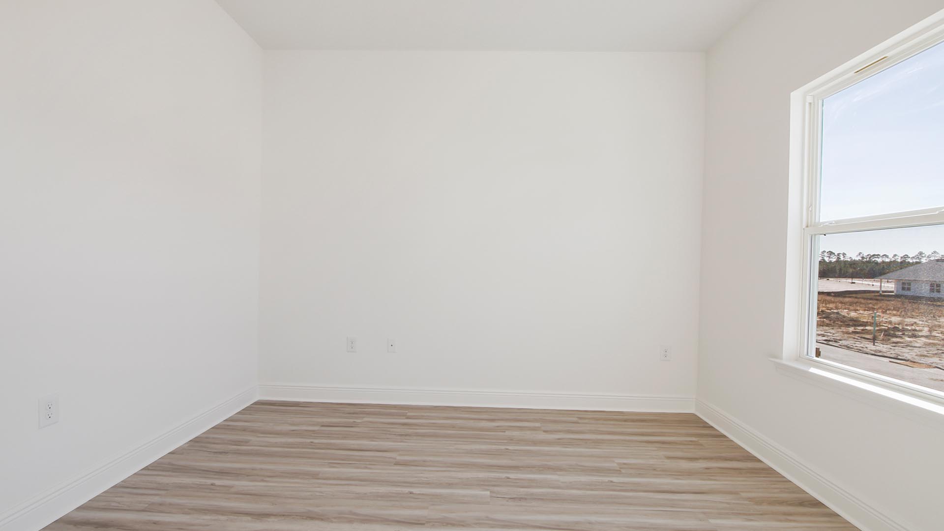 Guest bedroom four on the second level has carpet