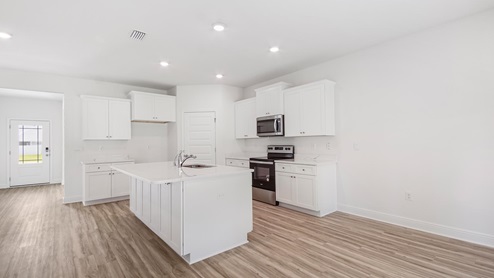 The Carol has an open kitchen design with spacious center island
