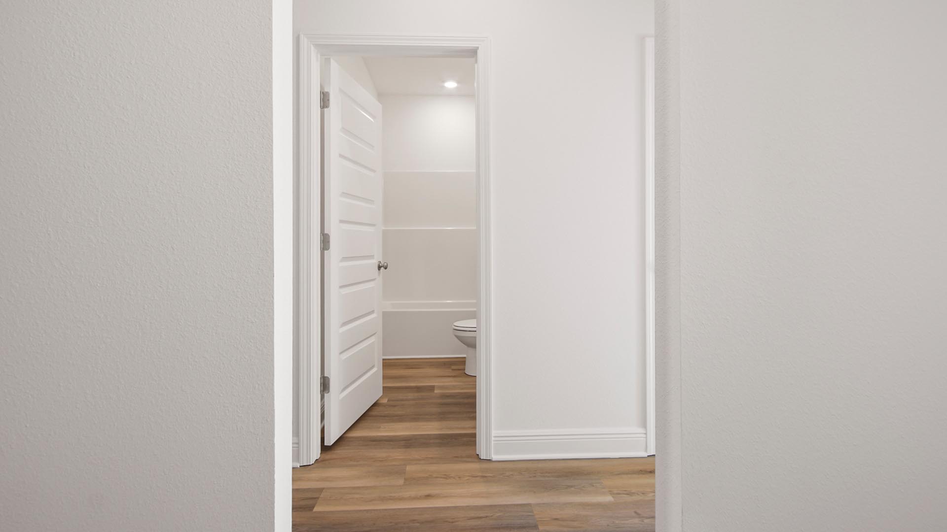 There is a dedicated hall leading to two of the guest bedrooms