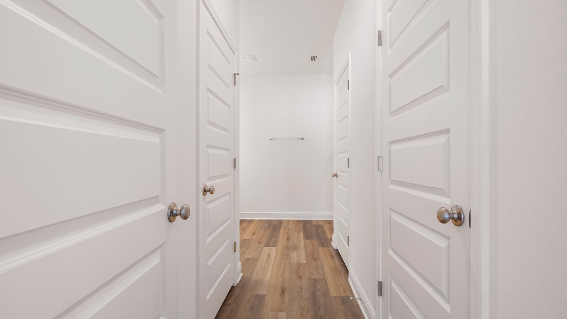 The primary bath has two closets
