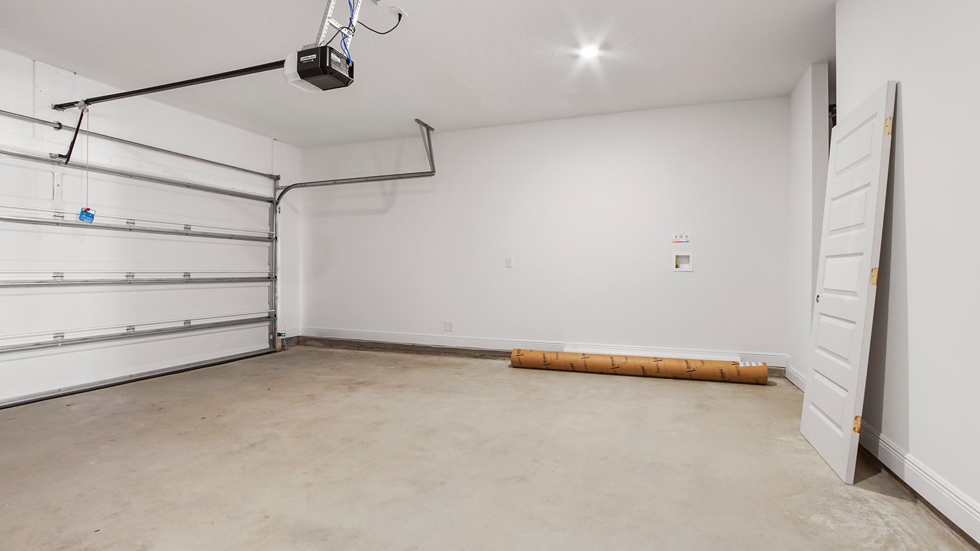 The Delray has a two car garage with an auto garage door opener