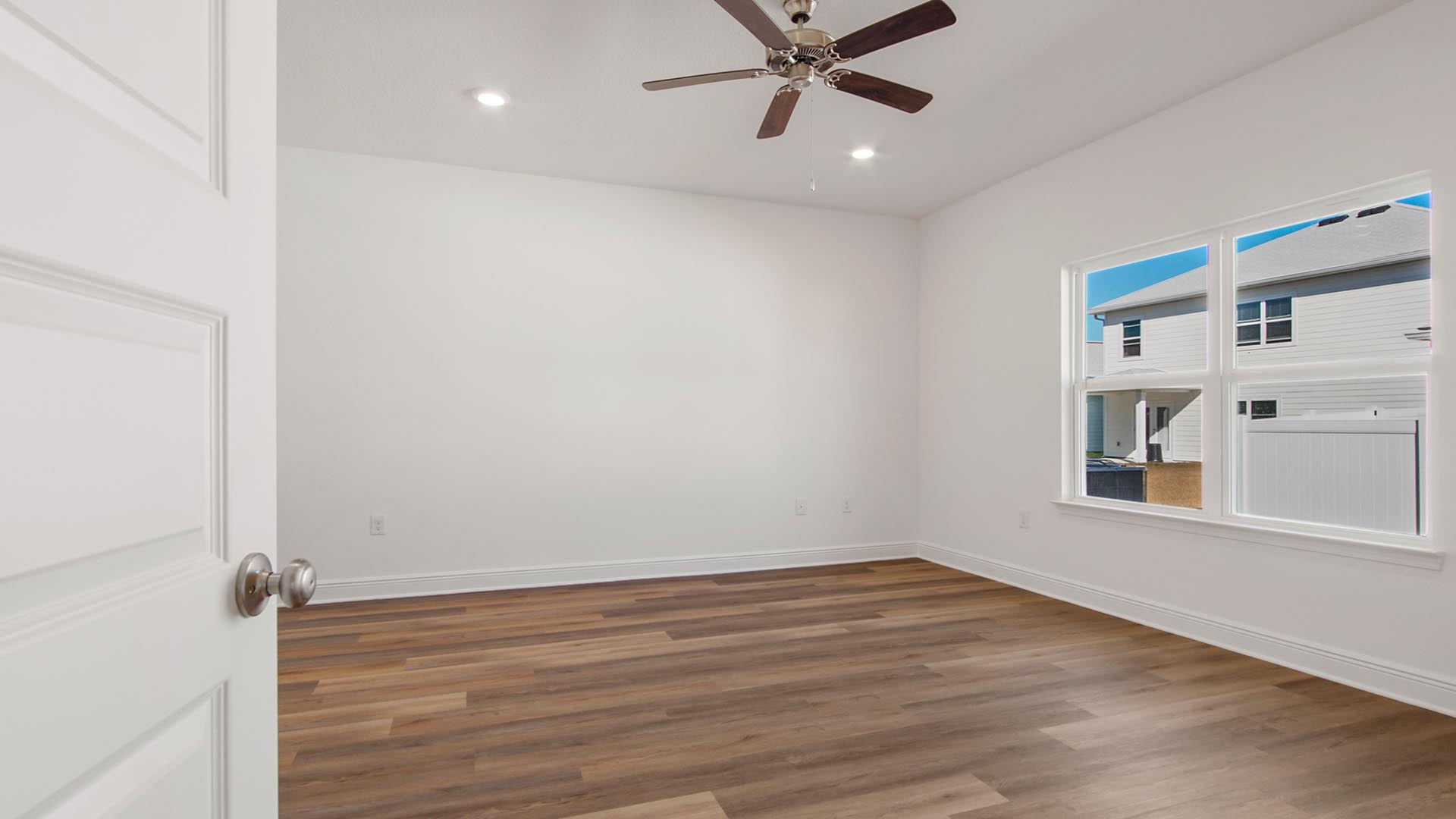 The primary bedroom is accessible from the living area