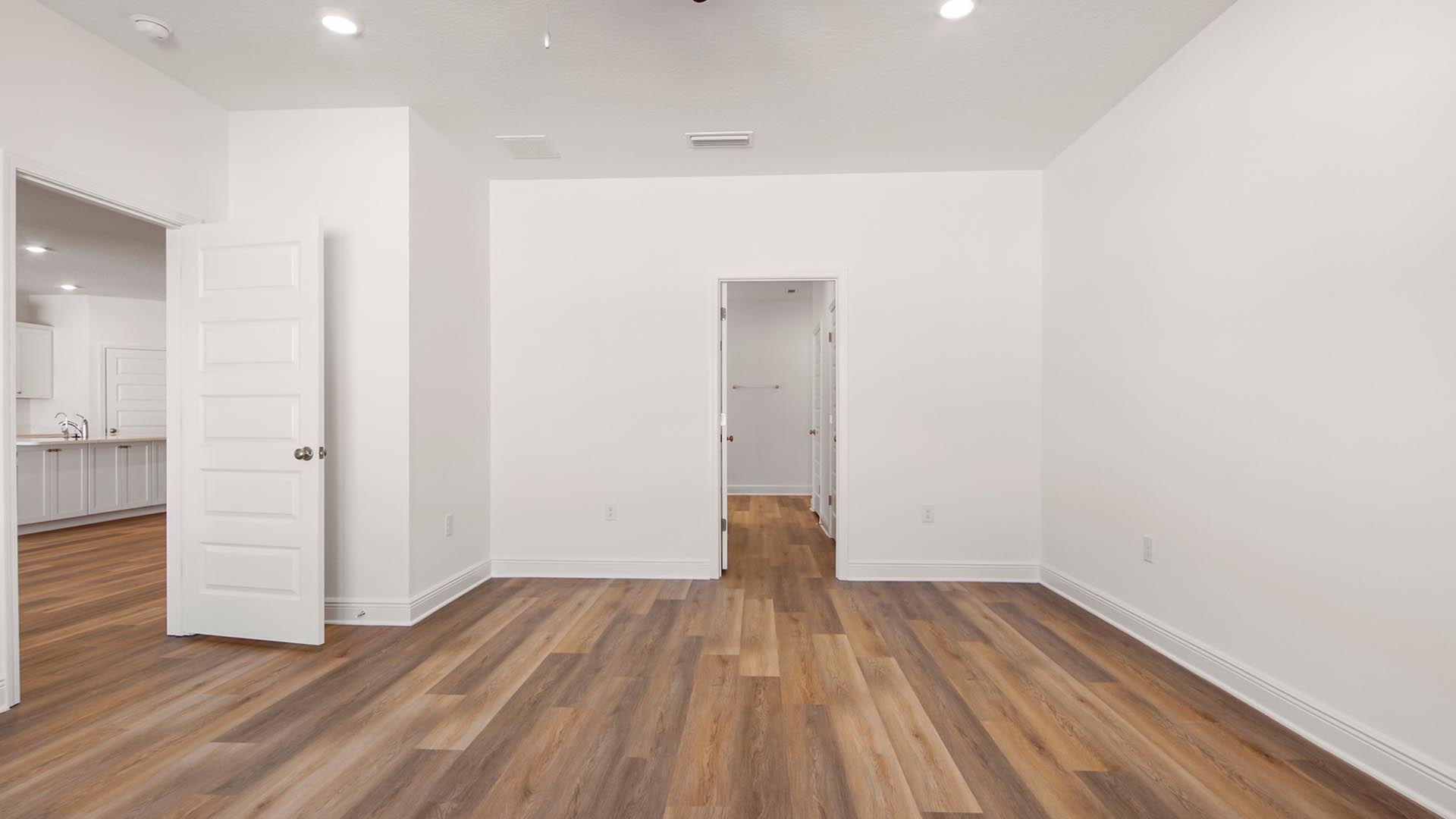 The primary bedroom has a spacious ensuite bathroom