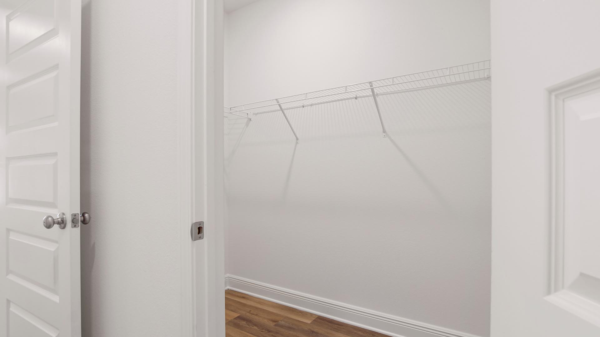 Both closets are spacious and have ventilated shelving