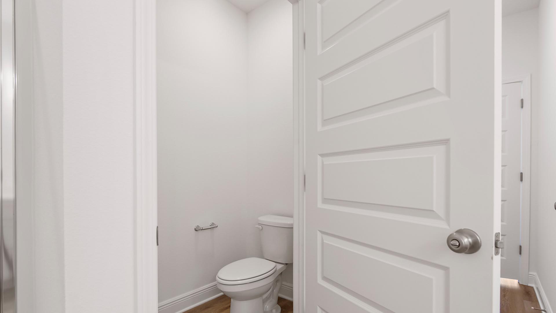 The primary bathroom has a separate water closet for privacy
