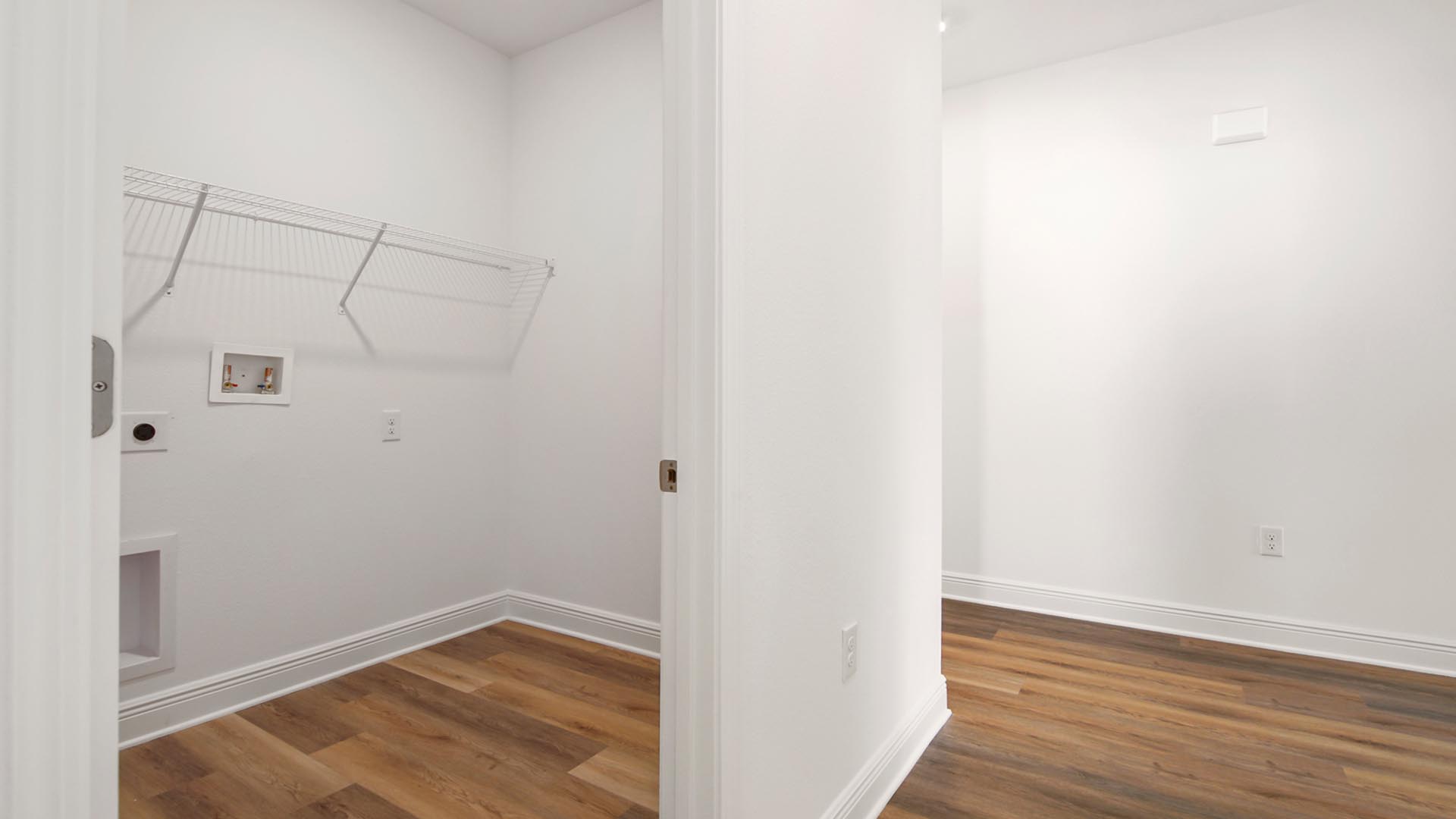 There is a laundry room with space for a full size washer and dryer