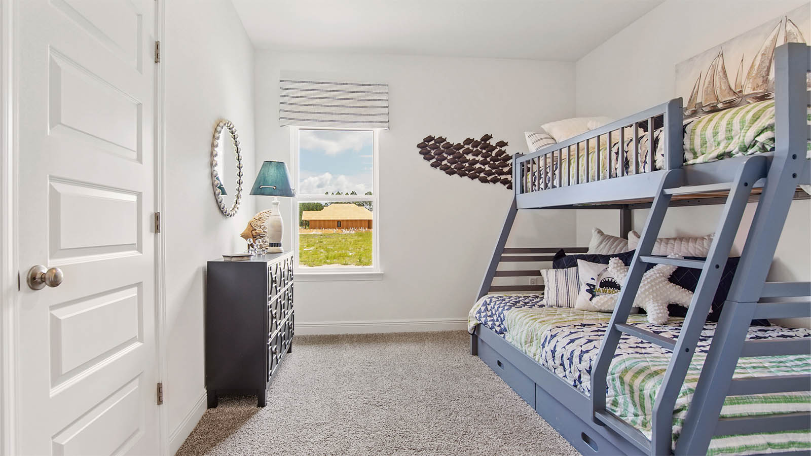 Bedroom three with a window and closet and carpet flooring.