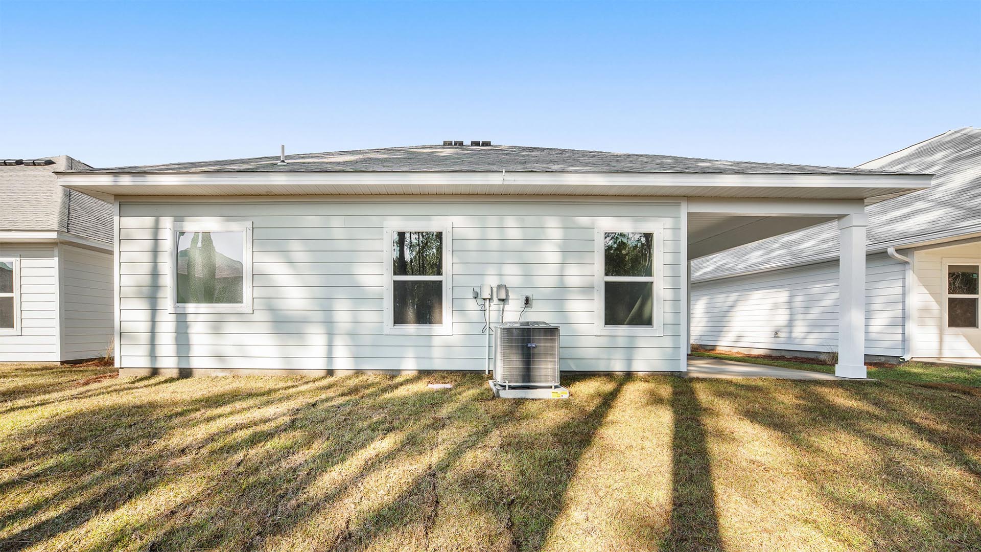 The exterior features Hardie siding