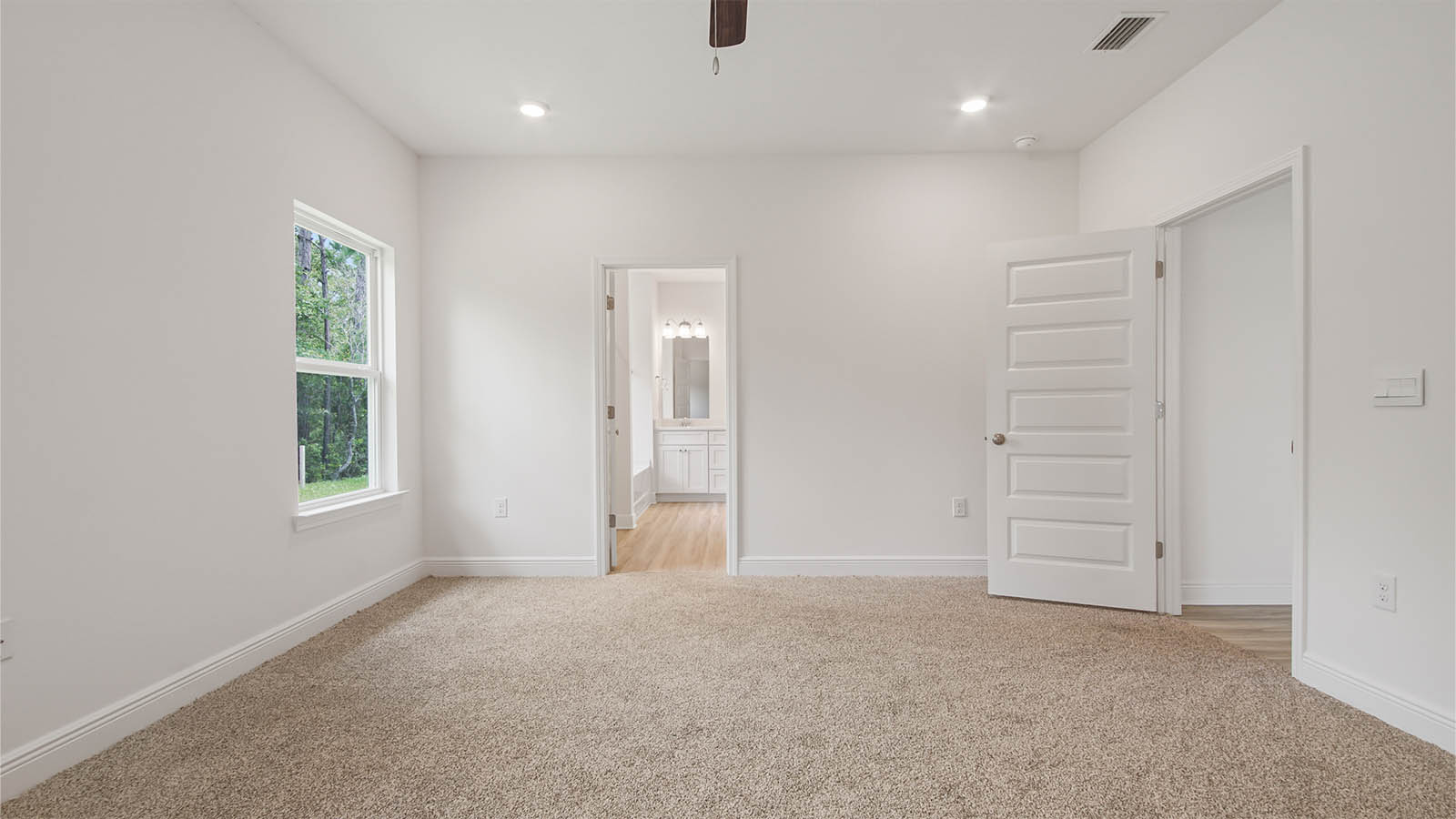 The primary bedroom is off the living area