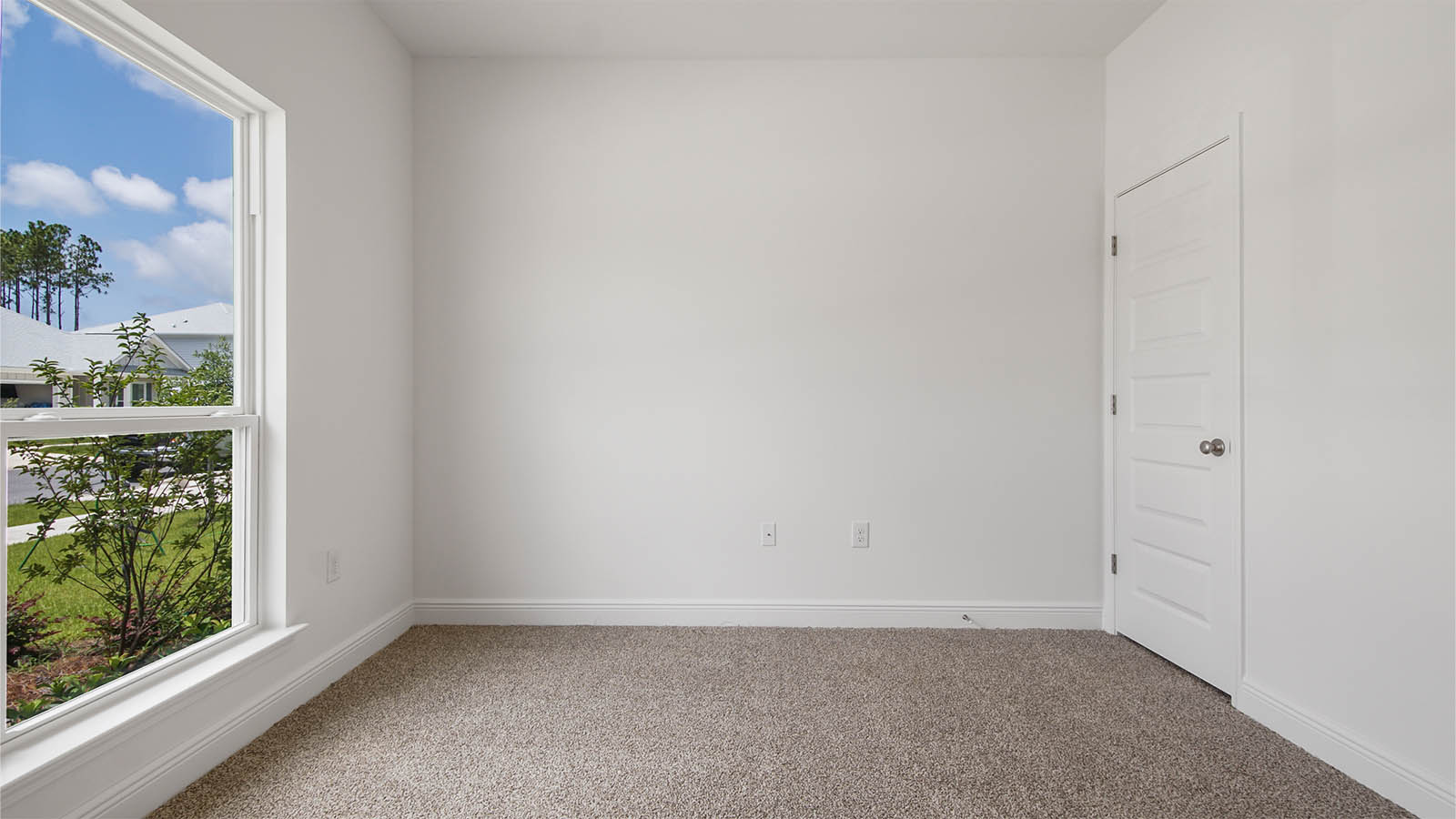 The Kennedy floor plan has two bedrooms off the front entry