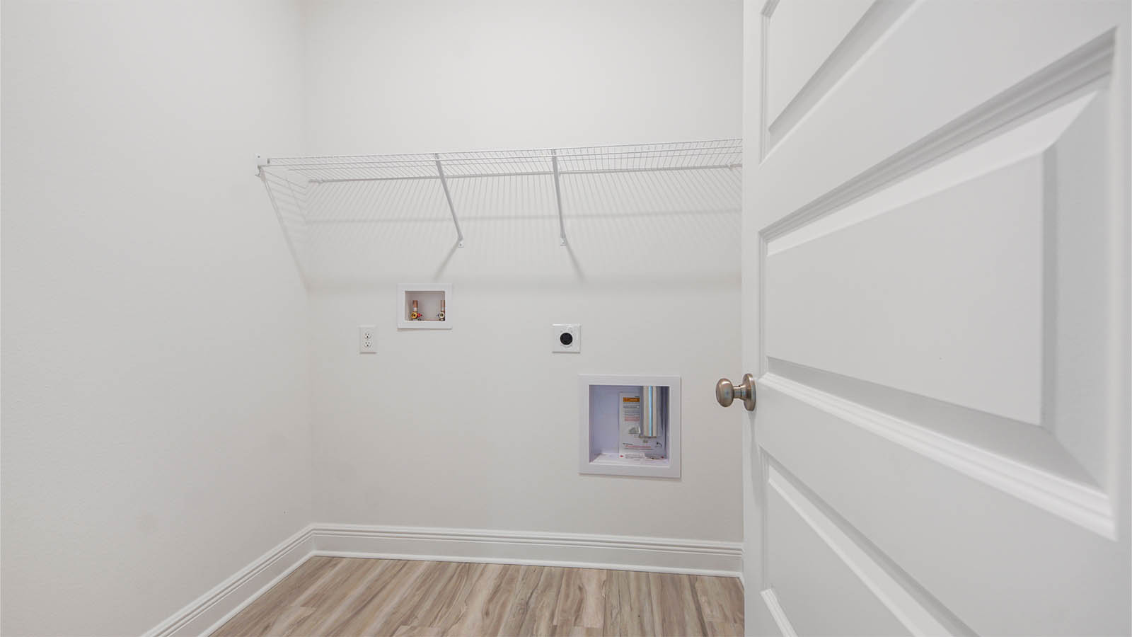 The Kennedy has a laundry room with space for a full size washer and dryer