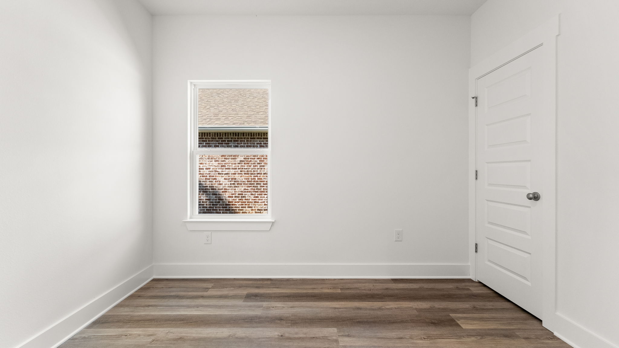 Guest bedroom four has EVP flooring