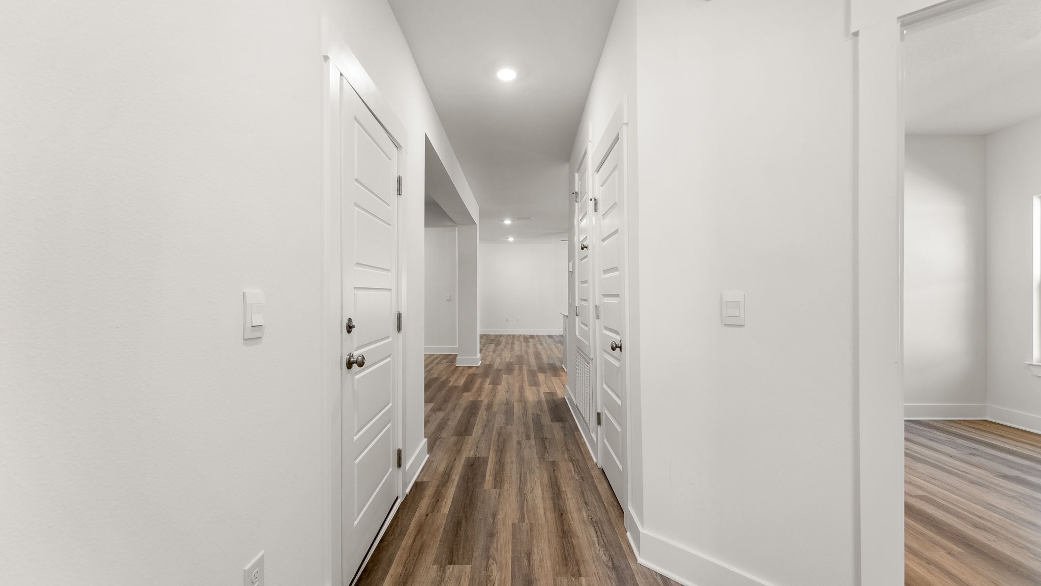 The entry has a bright foyer illuminated by the glass front door